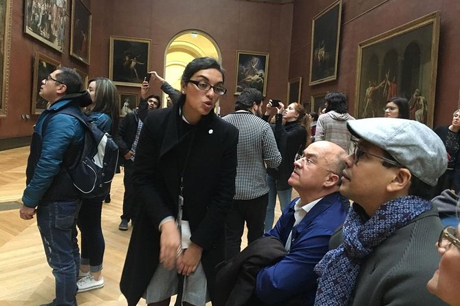 1h30 - Louvre Highlights optional 'families with kids' - Eng/Esp - Headsets, languages, and group size
