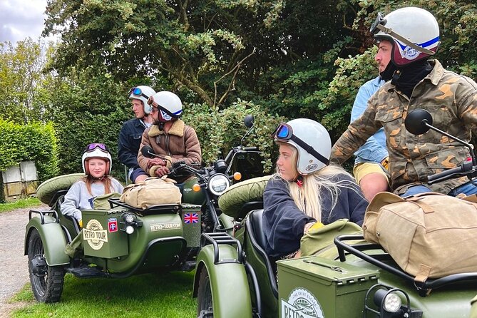 2- to 6-hour sidecar excursion on the D-Day Landing Beaches - Getting fitted in Bayeux