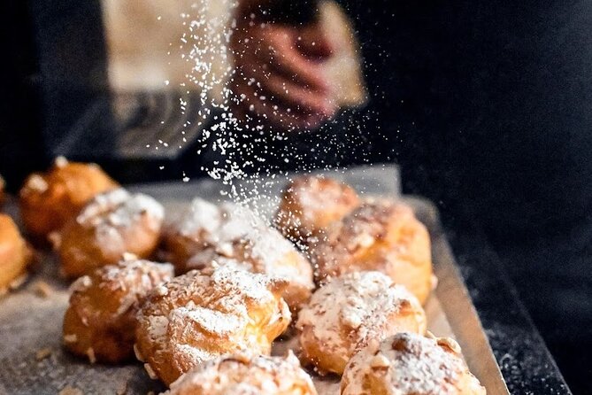 Authentic Parisian Gourmet Food Tour with 10 Local Dishes & Wines - Notre Dame: food among the islands and old streets
