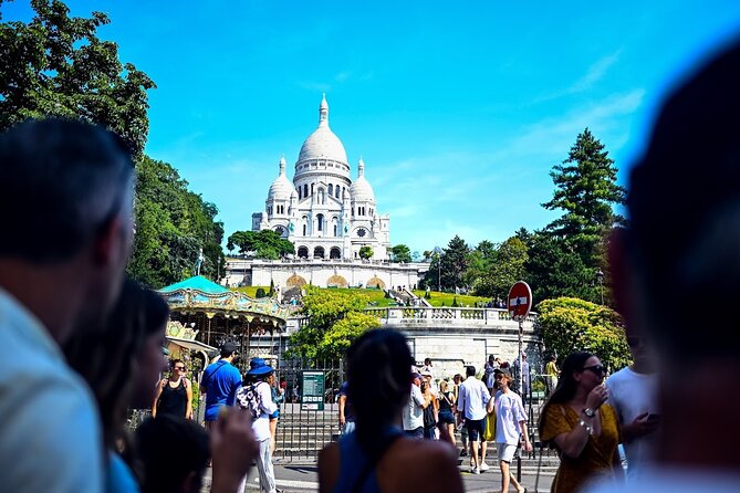 Authentic Parisian Gourmet Food Tour with 10 Local Dishes & Wines - Montmartre: from chocolates to a shared table