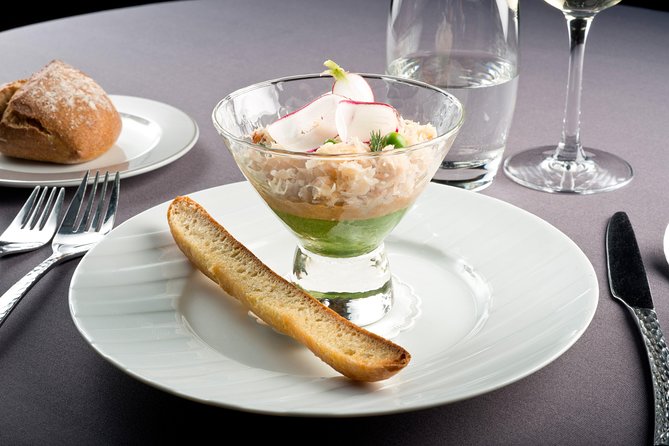Bateaux Parisiens Seine River Gourmet Dinner & Sightseeing Cruise - Boarding beneath the Eiffel Tower at 8:30 pm