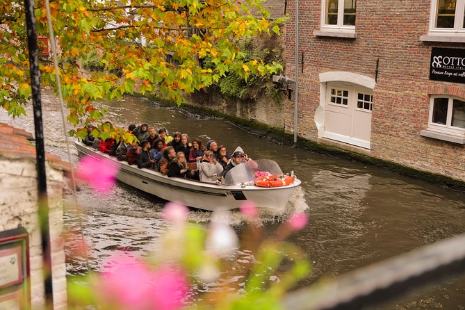 Bruges Guided or Audio Trip with Canal Cruise Option from Paris - Free time for chocolate, lace, lunch, and museums