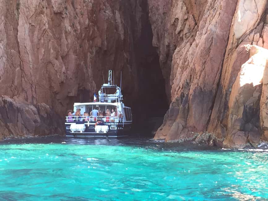 Cargèse: Scandola, Girolata, and Piana Afternoon Boat Tour - The return through Piana at sunset