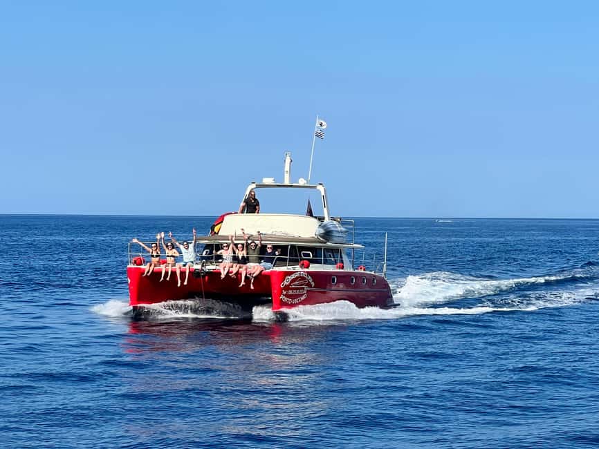 Catamaran cruise to the Lavezzi Islands - Sailing past Cavallo Island