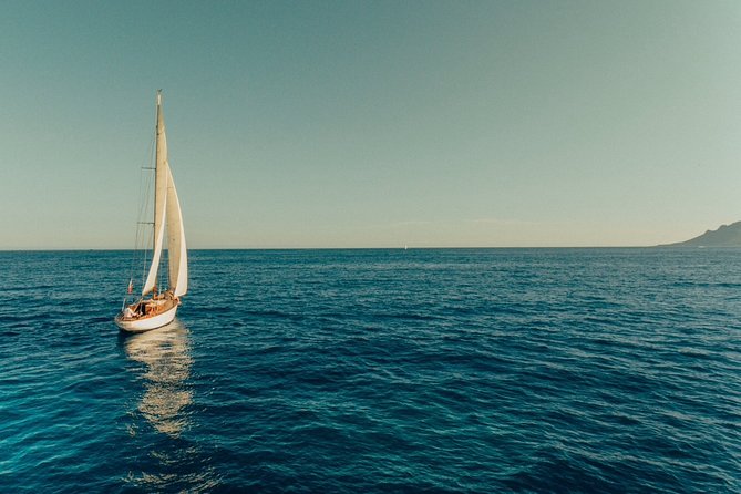 Classic Yacht Sailing in Cannes - Massif de l’Estérel: red rock and open-water views