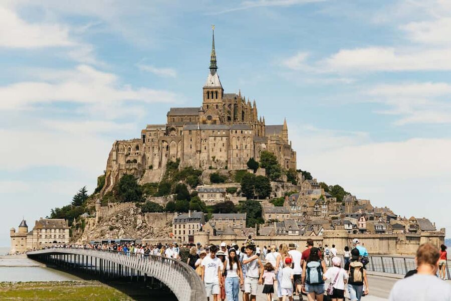 Day Trip to Mont-Saint-Michel from Paris - Meeting at the Eiffel Tower and settling into the coach