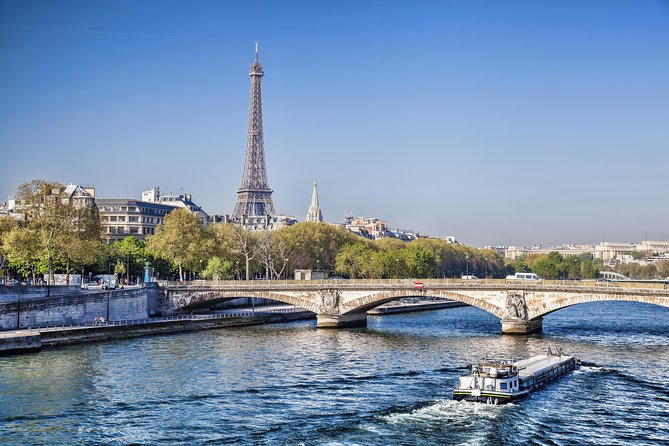 Eiffel Tower Summit Option with Seine River Cruise and City Tour - Reaching the Eiffel Tower’s second floor