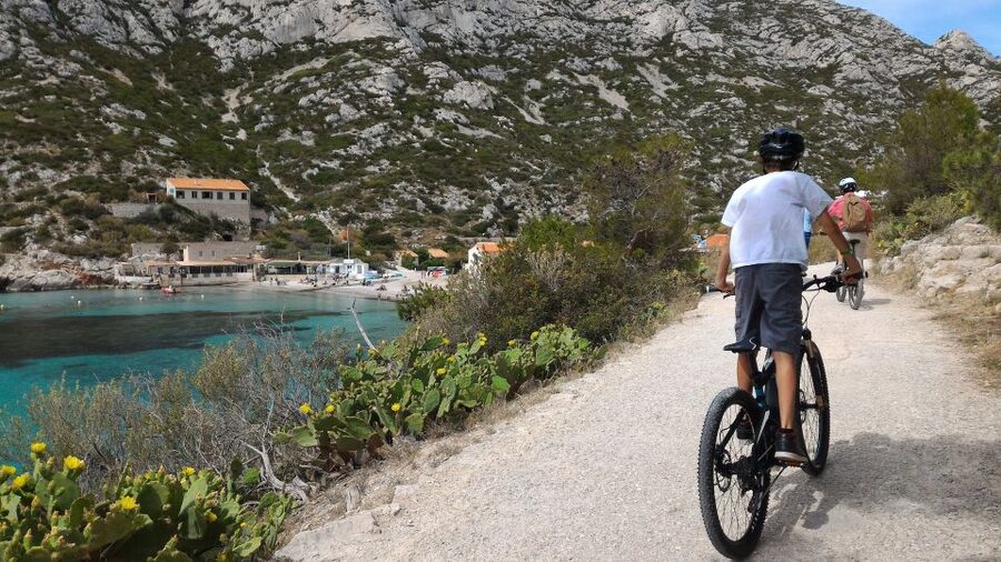 From Marseille: Calanques National Park E-Mountain Bike Tour - Starting at Pointe Rouge and getting ready to ride
