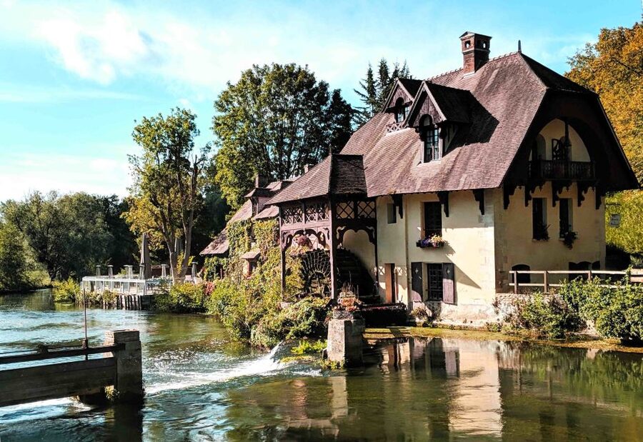 From Paris: Monet Impressionism Tour to Giverny by Minibus - Inside the house, kitchens, and former studio