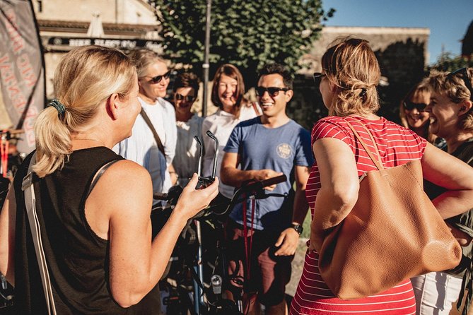 From Saint-Emilion : Electric Bike Day Tour with Wine Tastings and Picnic Lunch - Returning to Saint-Émilion for the village walk