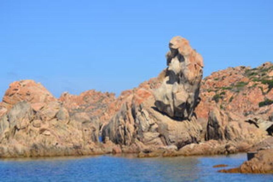 From Santa Giulia SUNSET Cruise & Apéritif - A swim in a quiet cove near Toro Island