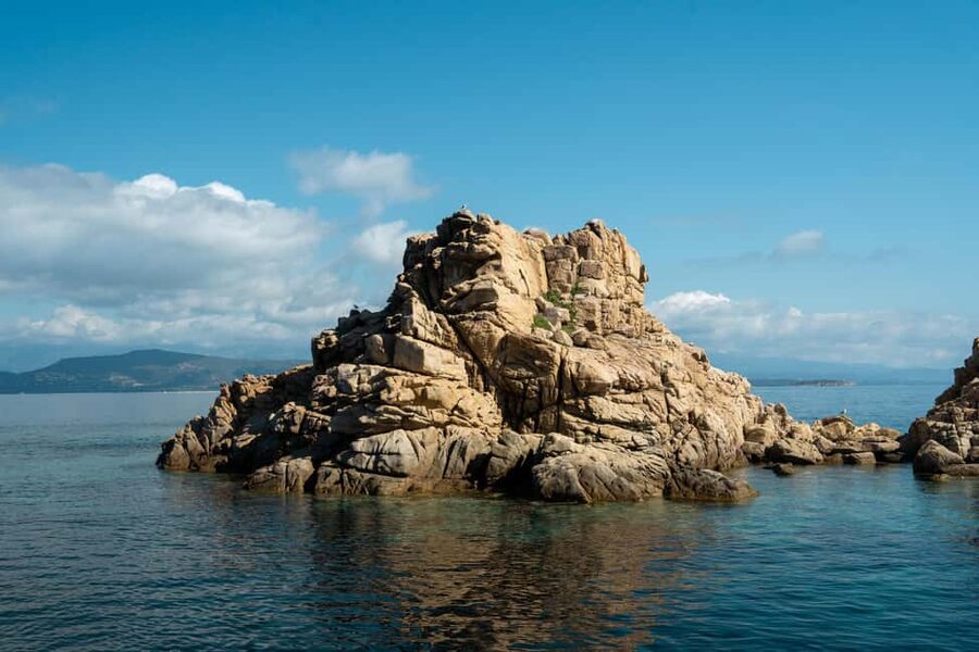 From Santa Giulia SUNSET Cruise & Apéritif - Corsican wine, charcuterie, and music at golden hour
