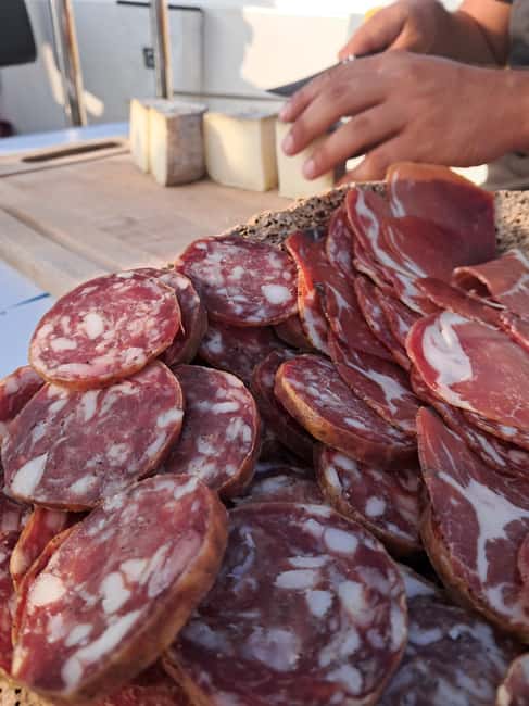 From Santa Giulia SUNSET Cruise & Apéritif - Weather matters more than the calendar