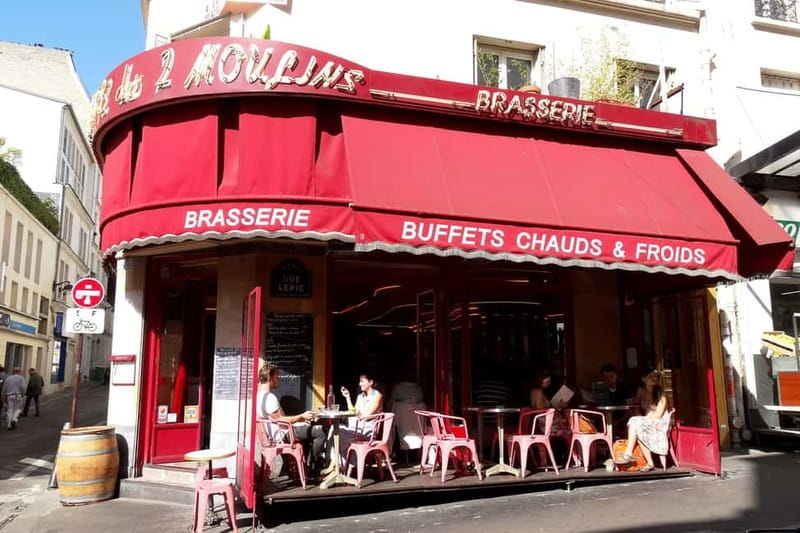 German private Walking Tour through Montmartre & Passages - Starting beside the Moulin Rouge at Place Blanche