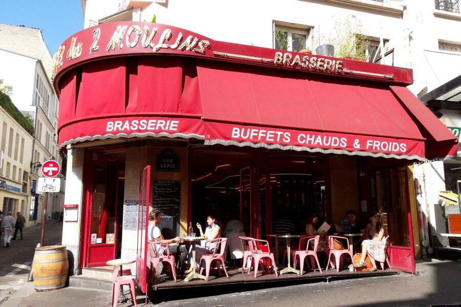 German private Walking Tour through Montmartre & Passages - Grands Boulevards and a changing Paris