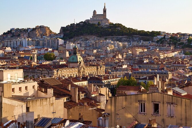 Guided Tour in Marseille: Vieux Port & Old City - Starting beneath the Vieux Port canopy
