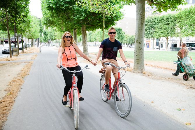 Highlights of Paris Bike Tour w/ a Local Guide (English or Dutch) - The Louvre, Musée d’Orsay, and Parisian Boulevards
