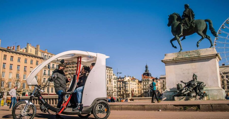 Lyon: Private Pedicab Tour of Top Landmarks & Hidden Gems - Entering Vieux Lyon and its traboules