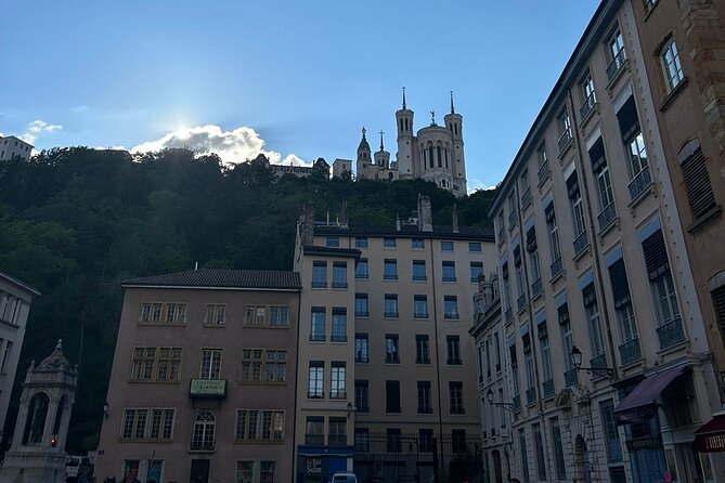 Lyon Walking Tour: Explore Top Sights & Hidden Gems - Reading the fountain at Place des Jacobins