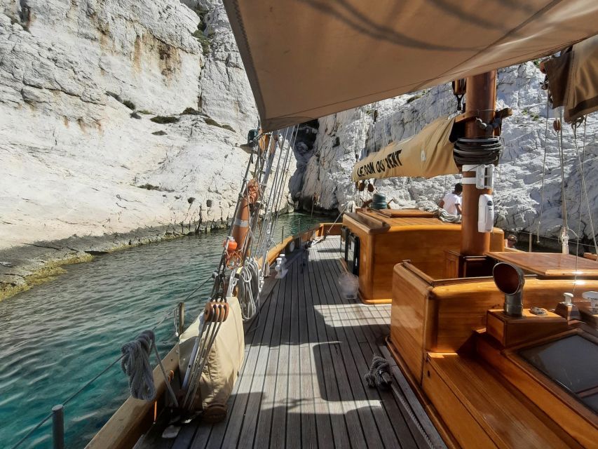 Marseille: Calanques Sailing Day Trip with Lunch and Wine - Swimming and snorkeling from the yacht