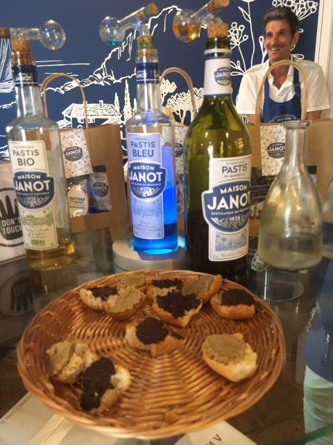 Marseille: E-Bike and Food Tour - Wine, cheese, and cold cuts at a shop dating from 1899