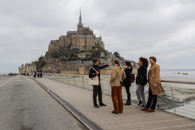 Mont Saint Michel Guided Day Trip with Abbey Entry from Paris - The first view of the tidal bay