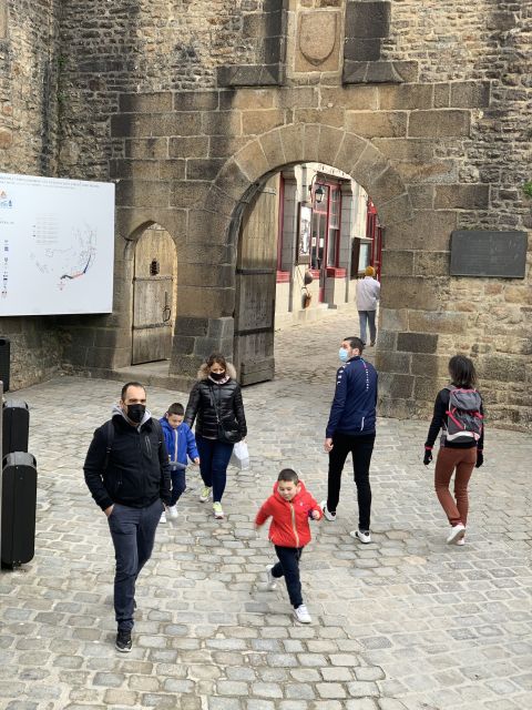 Mont Saint Michel: Walking Tour & Optional Abbey Ticket - Shuttle buses, meeting points, and getting there