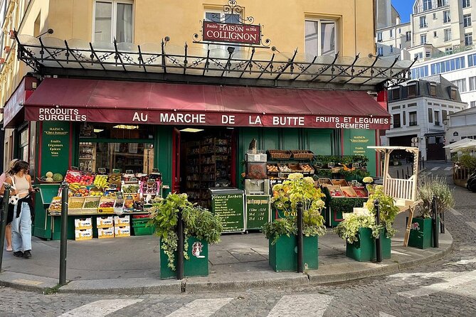 Montmartre Hill French Gourmet Food and Wine Tasting Walking Tour - Starting beside the Moulin Rouge