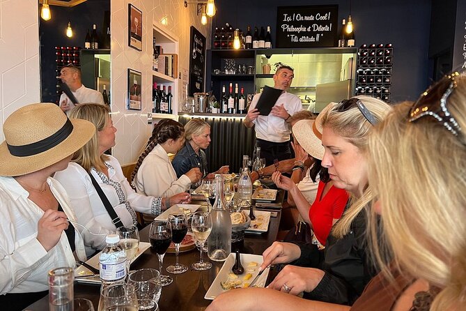 Montmartre Hill French Gourmet Food and Wine Tasting Walking Tour - Place du Tertre and the old artists’ quarter
