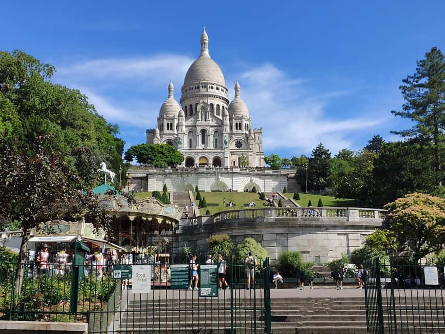 Montmartre Walking Tour with a Local Guide - Place Blanche and the Moulin Rouge