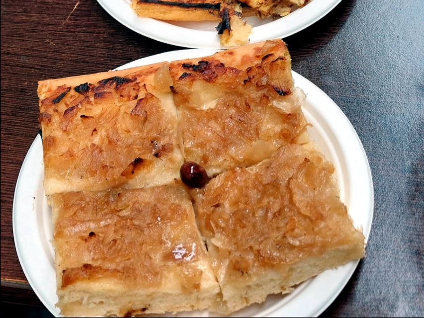 Nice: City Foods Guided Walking Tour - Place Rossetti, ice cream, and the sweet finish