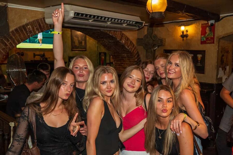 Nice: Party Bar Crawl with Club VIP, 6 Shots, and Games - The photographer and mascot add a fun record