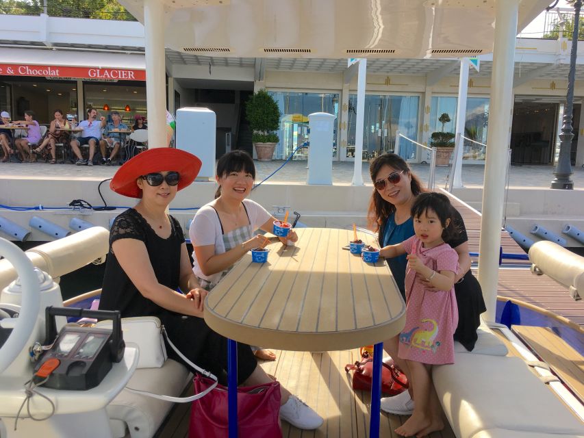 Nice: Private French Riviera Solar Boat Cruise - Taking the wheel under the captain’s guidance