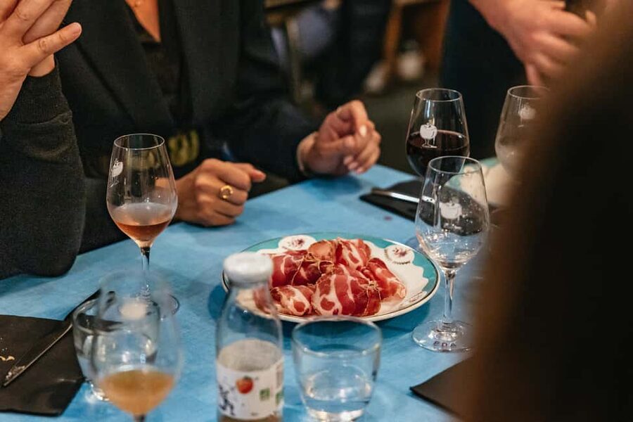 Nice: Sunset Food Tour with Full Meal and Wine - Pissaladière brings the Mediterranean flavors together