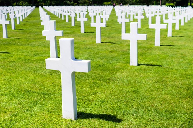 Normandy D-Day Small-Group Day Trip with Omaha Beach, Cemetery & Cider Tasting - German guns and bunkers at Longues-sur-Mer