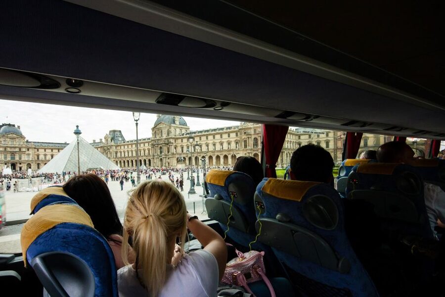Paris: Audio-Guided Bus Tour & Seine River Cruise - Who should book this experience?