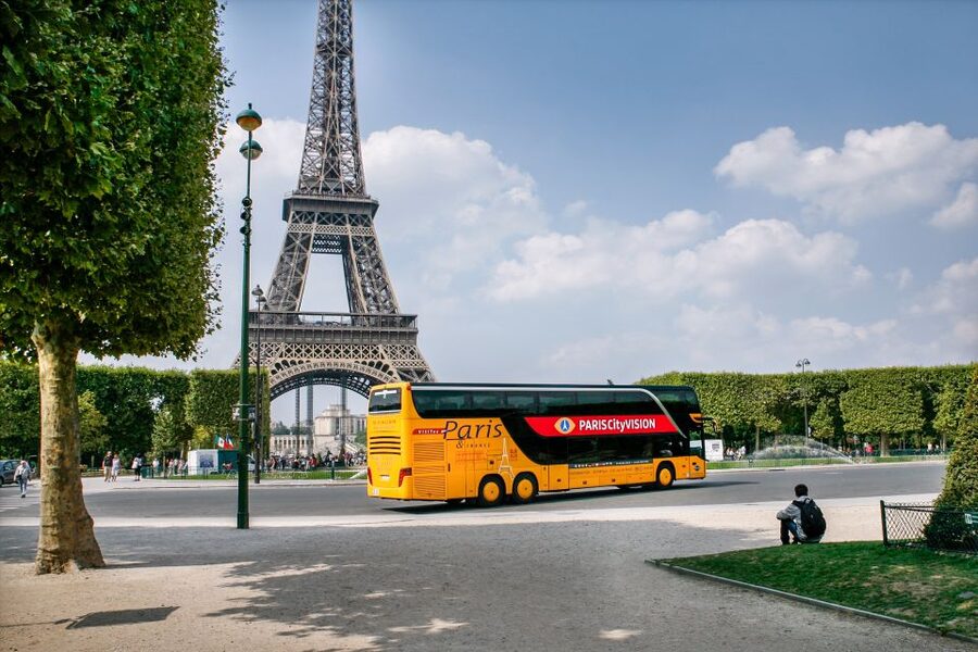 Paris: Audio-Guided Bus Tour & Seine River Cruise - The panoramic coach ride through Paris