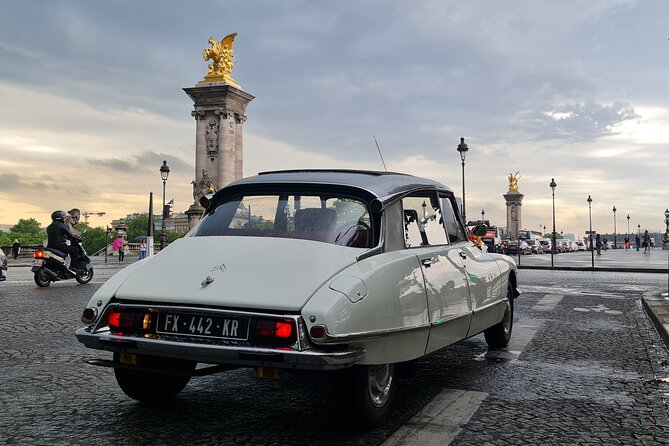 Paris City Tour 2h00 Citroën DS Vintage with Open Roof - Daytime traffic, evening light, and the vintage-car tradeoff