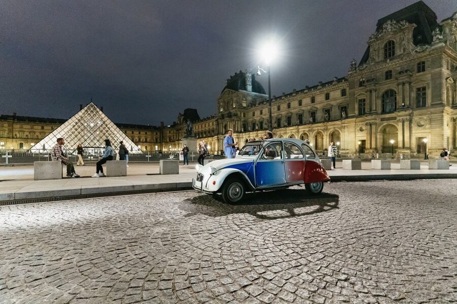 Paris: Discover Paris by Night in a Vintage Car with a Local - Champagne, cheese, and the price of the experience