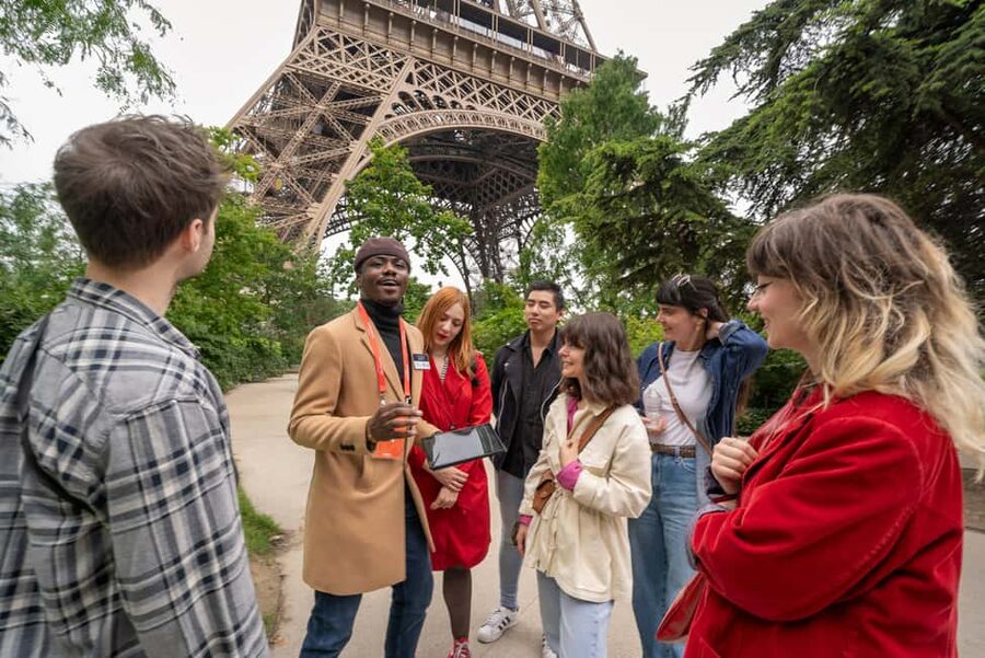 Paris: Eiffel Tower Guided Tour with Summit Access - The story behind the iron tower