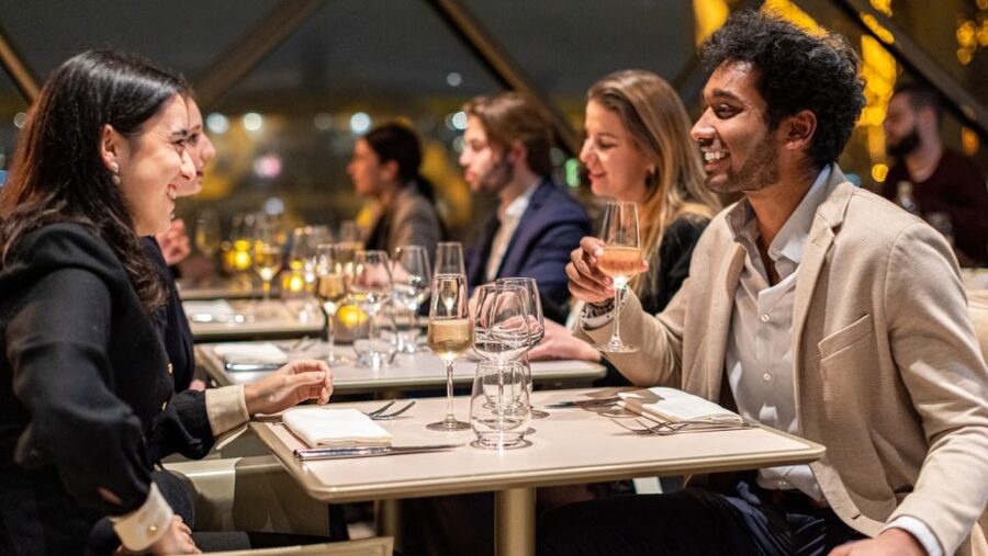 Paris: Elegant Dinner with Drinks in the Eiffel Tower - Taking the elevator to the first floor