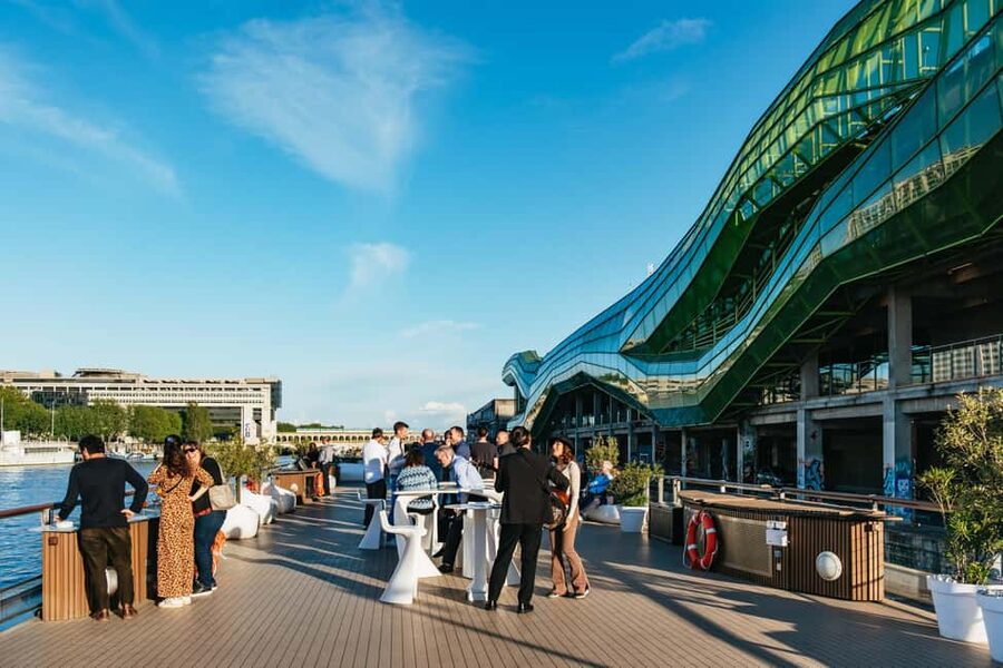 Paris: Gourmet Dinner Cruise on Seine River with Live Music - A table with a moving view of Paris