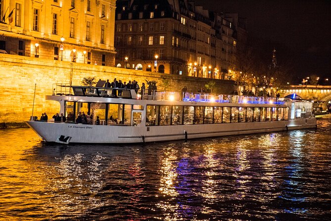 Paris Gourmet Dinner Seine River Cruise with Singer and DJ Set - Drinks, champagne, and extra costs