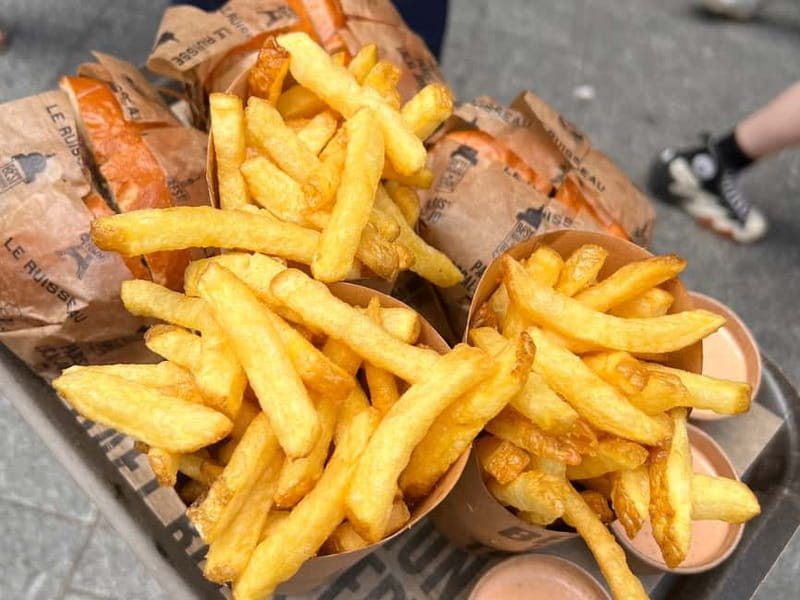 Paris: Le Marais Guided Food Tour with Tastings - Walking through the Marais between stops