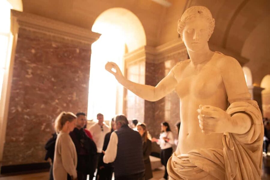 Paris Louvre Exclusive Semi Private Guided Tour Max 6 People - Finding the Louis XIV meeting point