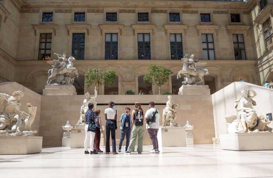 Paris: Louvre Museum Highlights and Mona Lisa Tour - Entering the Louvre, with one security line still to face