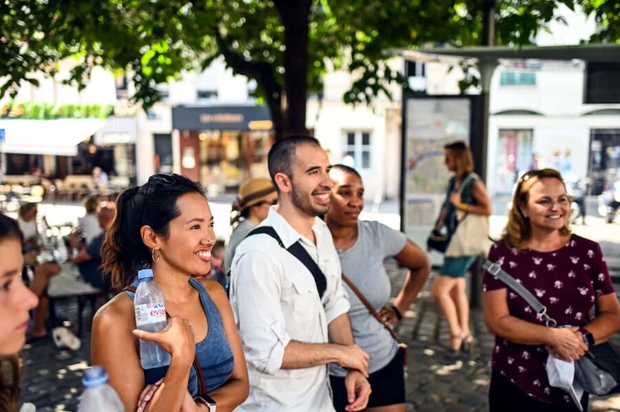 Paris: Montmartre Food Tasting Walking Tour with Secret Dish - Cured meats at the local butcher