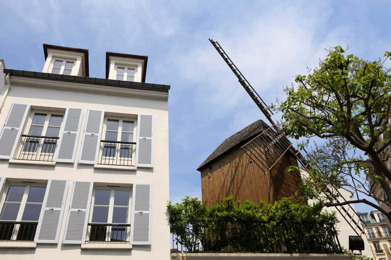 Paris: Montmartre Hidden Gems and Highlights Walking Tour - Rue des Abbesses and the village feel