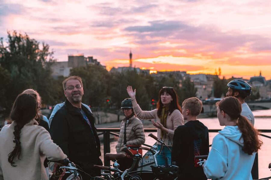 Paris: Night Small-Group Bike Tour and Boat Cruise - Invalides, Champs-Élysées, and the final river cruise