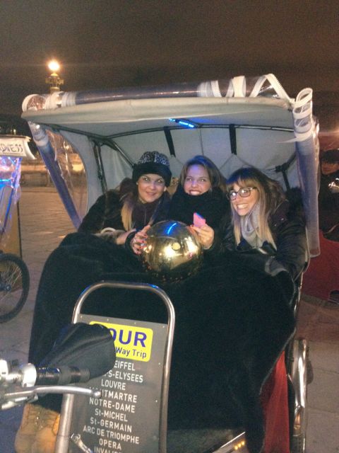 Paris: Nighttime Tuk-Tuk Tour - The Louvre, Orsay, and Opera after sunset